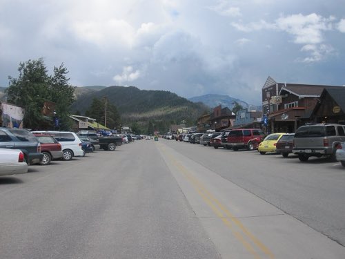 Grand Avenue — the boardwalk main street, with the mountains at the end of it